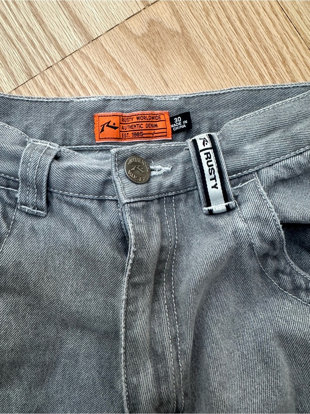 Rusty Light Gray Denim Jeans with Orange Tag